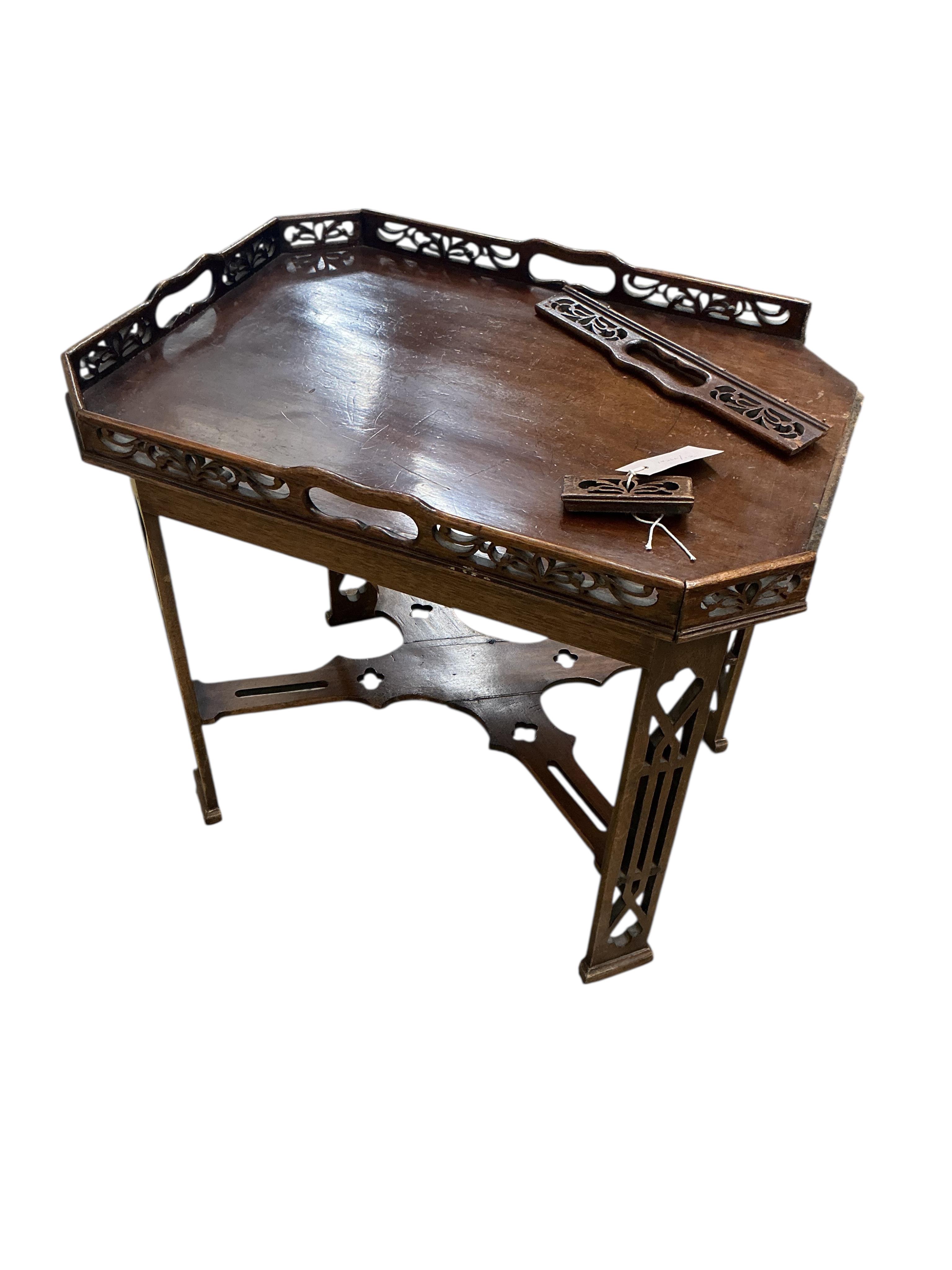 A George III style mahogany silver table with gallery top, in need of restoration, width 54cm, depth 41cm, height 47cm